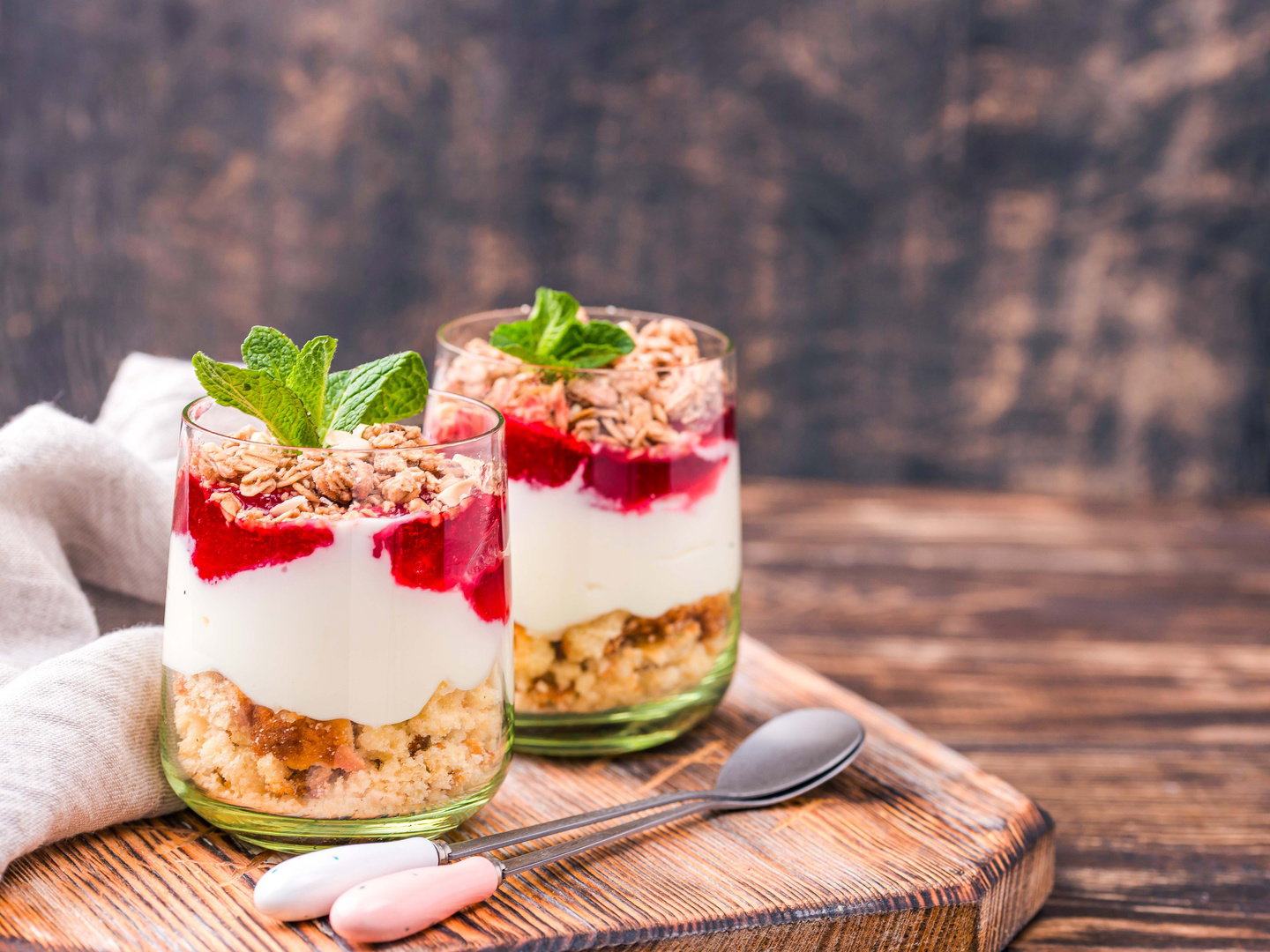 Yogurt with cereal on glasses