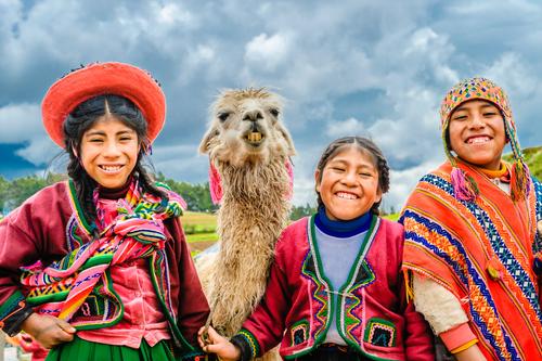 Group of kids with an alpaca, Cuzco