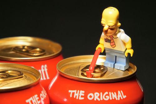 Bart Simpson opening can of beer