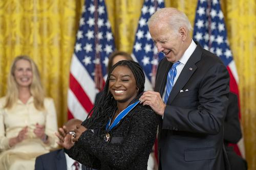 Simone Biles and Joe Biden