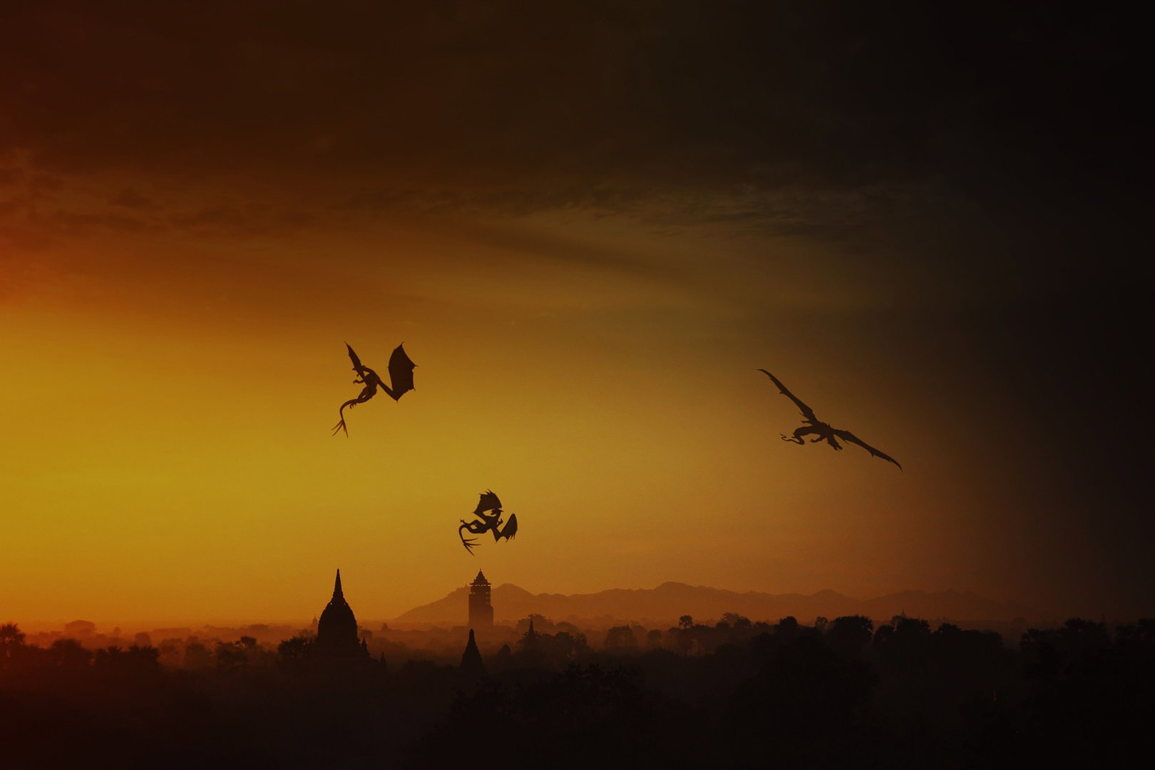 Dragons flying in the horizon