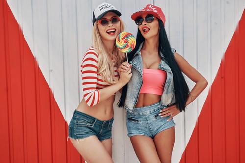 Girls holding a lollipop