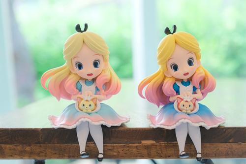 Alice in Wonderland two figurines