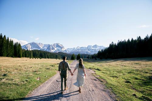 Couple holding hands