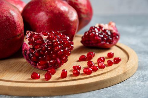 Pomegranate on a wooden board