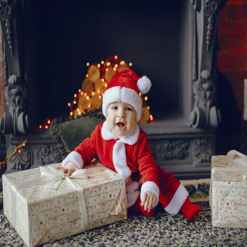 Baby dressed like Santa Claus