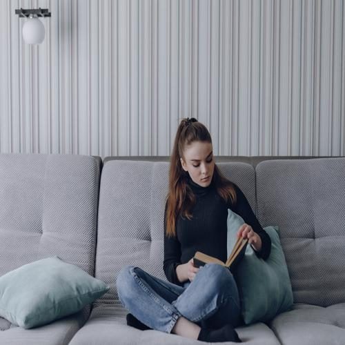 Girl on the couch reading