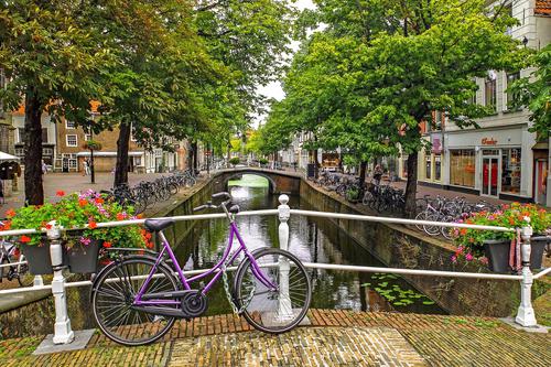 Bike by the canal in Delft