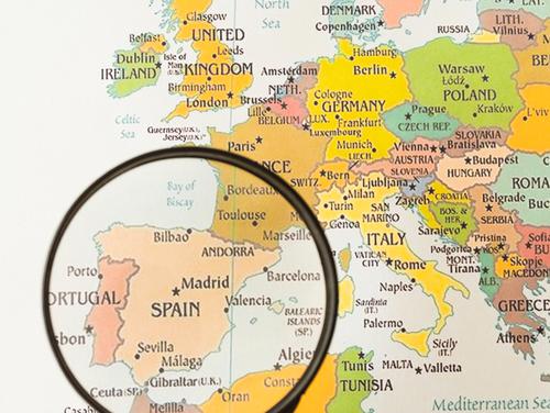 Magnifying glass showing Spain