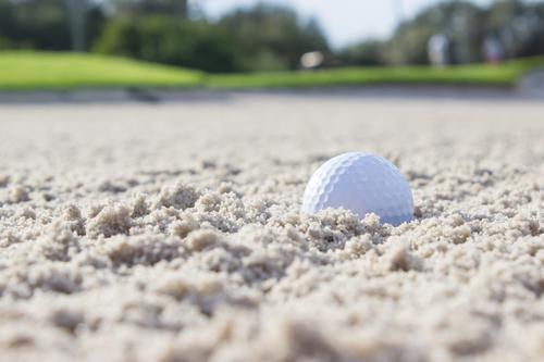 Golf ball in the sand