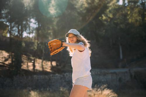 Woman playing baseball