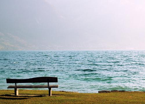 Wooden bench by the sea