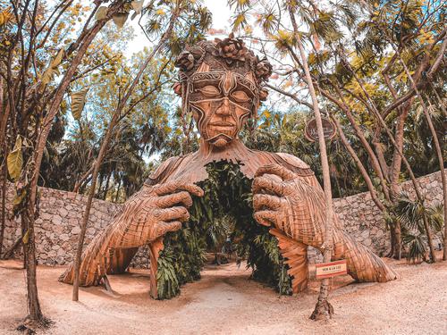 Wooden statue in Tulum