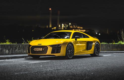 Yellow Audi at night